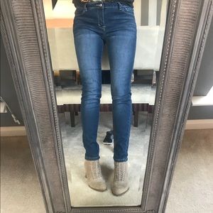 Kensie knockout skinny mid rise jeans.